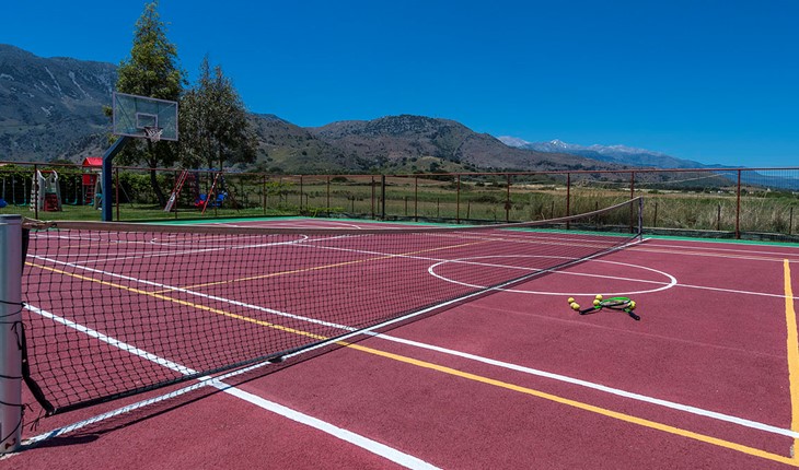 Tennis and basketball multi-sport court with mountain views